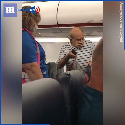 Passengers Disbelief As Man Kicked Off Plane This Elderly Man Is Being Removed From A Plane