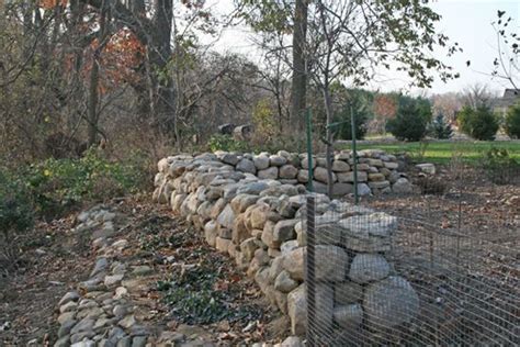 The recipe for moss stone, along with several other decorative blocks. Building A Stone Fence From Fieldstone | Fence landscaping ...