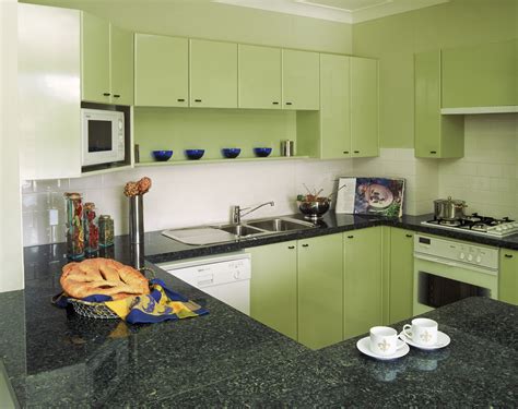 I know you just purchased appliances but there is nothing better than crisp new stainless a cheerful red island, accessories with patina, and custom cabinetry give this 1960s kitchen a modern update. Image result for green black 1960s kitchen | Retro kitchen ...