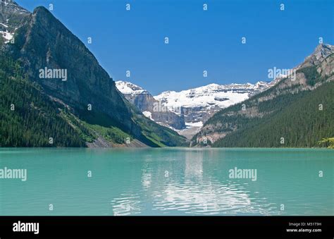 Turquoise Waters Of Lake Louise In Banff Alberta Stock Photo Alamy