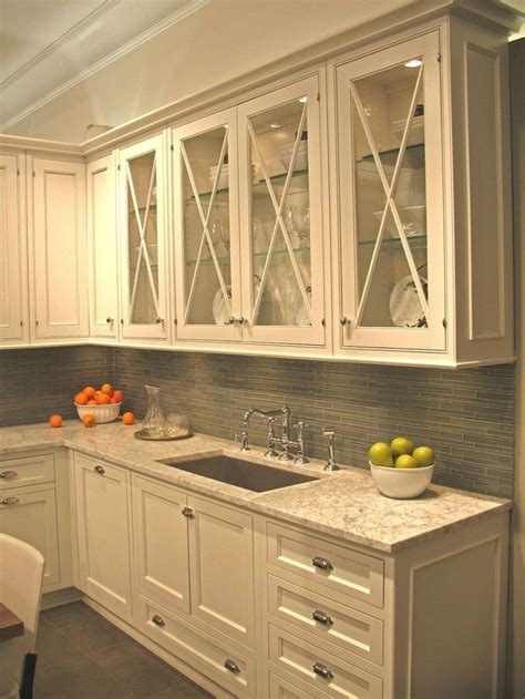Right here, you can see one of our kitchen cabinets glass doors collection, there are many picture that you can surf, don't forget to see them too. Glass fronts on just a row of cabinets | Cream colored ...