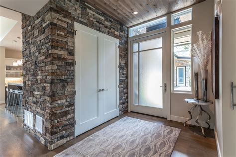 The Entry Vestibule In This Home Is Intimate And Transitions Causally