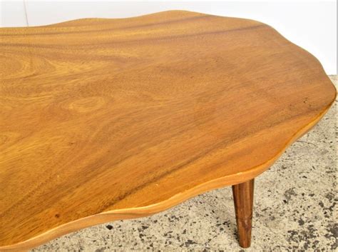 The joinery incorporates a number of mortise and tenon joints. Organic Modern Hawaiian Monkey Pod Wood Table For Sale at 1stdibs