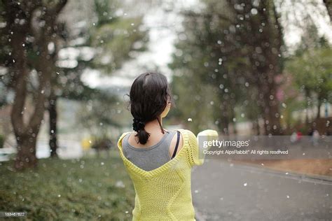 Young Girl Getting Wet In Rain Photo Getty Images
