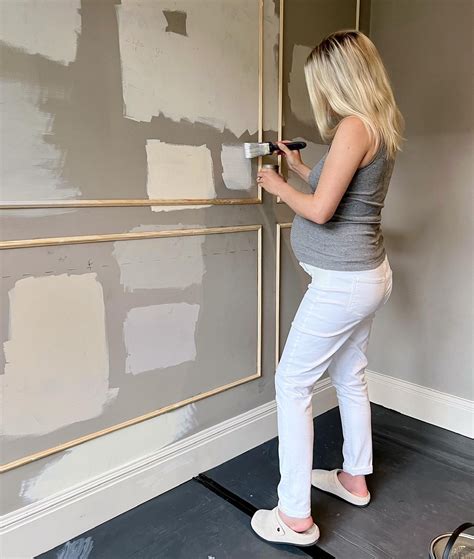 Pregnant Mollie King Shows Off Blossoming Baby Bump As She Decorates