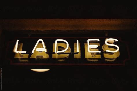 Neon Sign Ladies Restroom By Stocksy Contributor Bonninstudio
