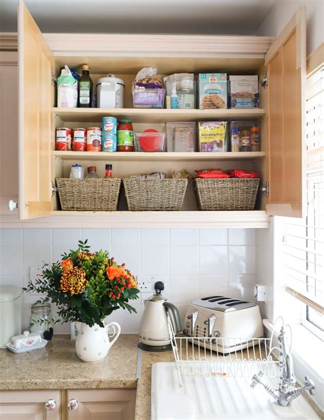 How To Organize Your Kitchen Cabinets And Create Space Dainty Dress Diaries