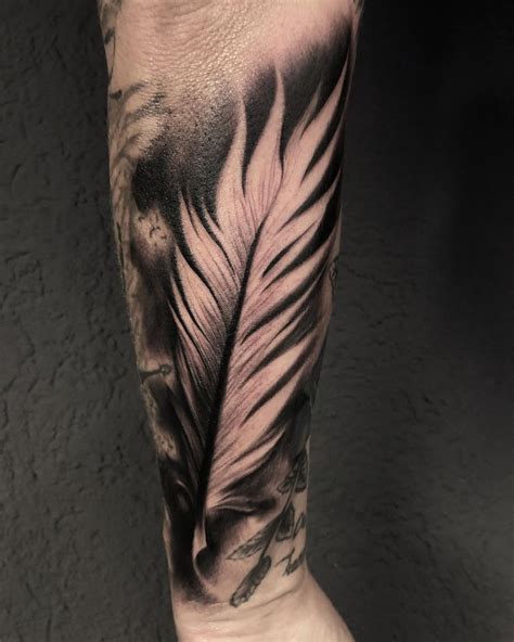 Amazing Feather Tattoo Designs You Need To See Feather Tattoo Design Indian Feather
