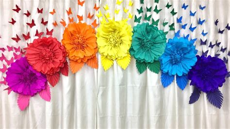 Choose some scrap paper that works for your theme and create these easy pinwheels! Easy paper flowers birthday decoration at home| - YouTube