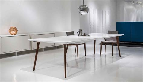 A modern, wood dining table can impart a classic, more organic touch to an otherwise contemporary room, and serve as a beautiful, modern kitchen table. Ultra Modern Dining Set — BreakPR | Davis furniture, Modern dining room set, Modern dining room