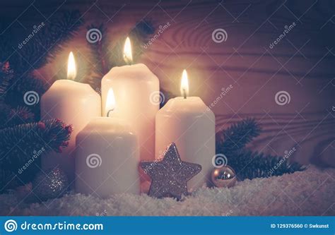 Four Burning Advent Candles And White Snow Stock Photo Image Of