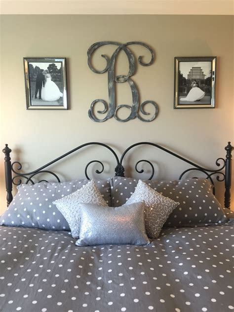 Idea For Above The Bed In Master Bedroom Monogram And Picture Frames Master Bedroom Wall