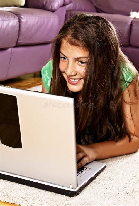 Girl Child Using Laptop Computer At Home Stock Image Image Of