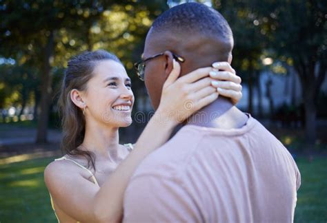 Love Park And Smile With An Interracial Couple Bonding Outdoor