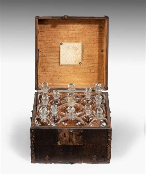 eighteenth century fitted decanter box with thirteen cut glass decanters bada