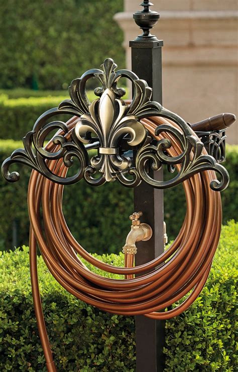 Product description this heavy duty garden hose holder will look wonderful attached to your home, garage, shed, fence etc., and it hose reels and storage 46435: Add a functional and decorative touch to your garden with ...
