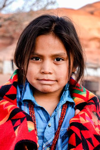 How do you make a pretty boy even prettier? Little Navajo Native American Boy With Long Hair In Monument Valley Arizona Stock Photo ...