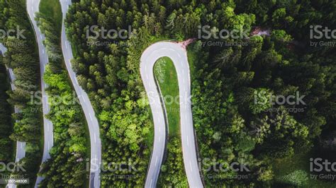 Aerial View Of Curvy Mountain Road In Austrian Alps Stock Photo