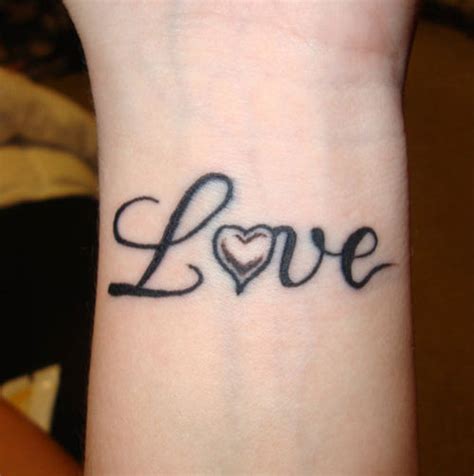 Tattoo mãe and heart on a wrist. 37 Love Tattoos That Showcase Eternal Love