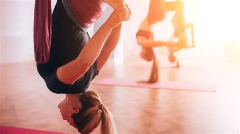 aerial yoga tips for beginners health benefits poses keevs