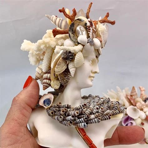 Miniature God Seashell Sculptures A Pair Chairish Shell Art