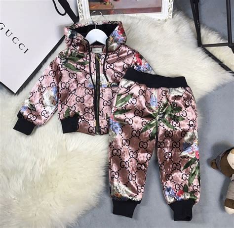 Pin By Lavish Fashions On Designer Baby Baby Girl Tracksuits Gucci