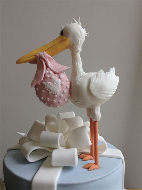 Close Up Of Stork Hand Modelled In Sugar Paste To Match Baby Shower