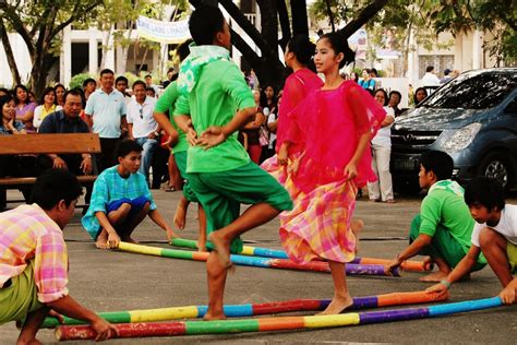 tinikling the national dance of the philippines with bamboo poles traditional music