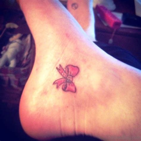 40 Decent Bow Tattoos On Foot Tattoo Designs