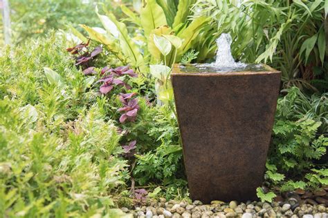 Here is a really cool way to create your own water feature at your home! 3 Beautiful DIY Fountain Projects Using Planters ...