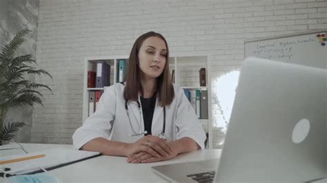Remote Medical Consultation Female Doctor Talking With Patient Online Videochat On Laptop
