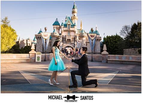 Couple Proposing In Front Of Castle At Disneyland Beach Wedding