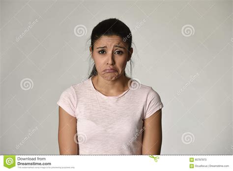 Young Beautiful Hispanic Sad Woman Serious And Concerned In Worried
