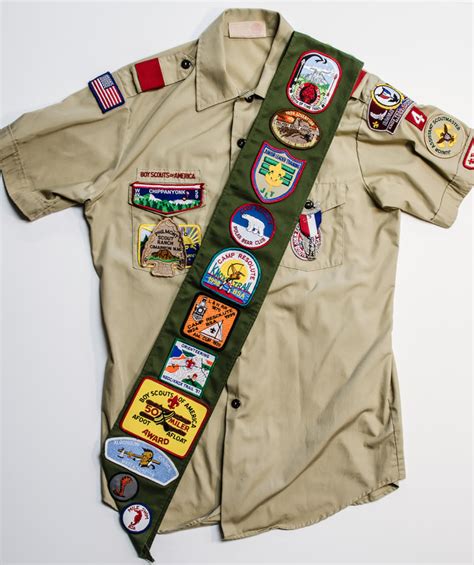 Eagle Pin And Merit Badge Sash On Boy Scout Uniform Stock Photo