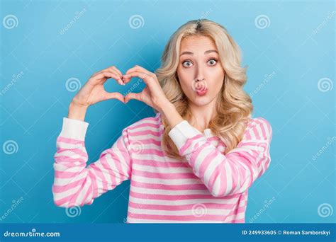 Photo Of Flirty Millennial Blond Hairdo Lady Show Heart Blow Kiss Wear Striped Shirt Isolated On