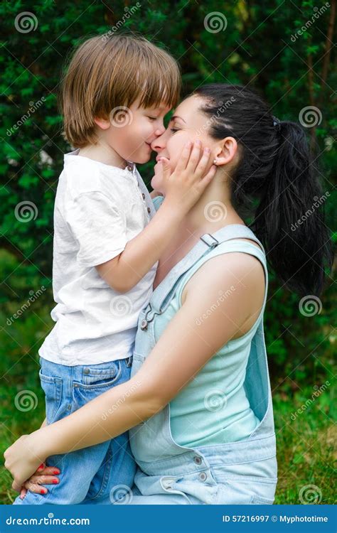 Loving Son Kissing His Happy Mother On The Nose Stock Image Image Of
