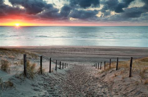 Sand Path To North Sea Beach At Sunset Stock Photo Image Of Cloud
