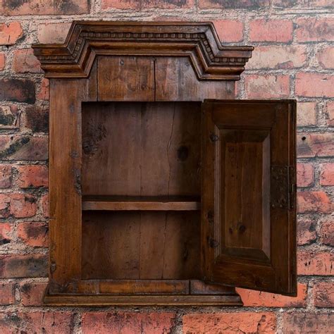 You can also attach cabinets to the plasterboard withhelp mounting racks, which are first fixed on the wall (on the sheet and metal frame at the same time). Small Antique Hanging Wall Cabinet from Denmark For Sale at 1stdibs