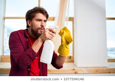 Man Cleaning House Cleaning Agent Stock Photo 1077594146 Shutterstock