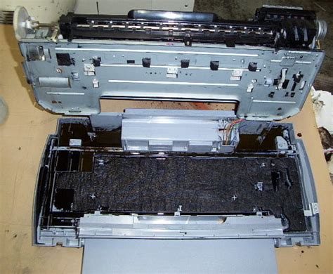 When checking the printer status, the message ink absorber full, error code: Ink waste tank full, really really full | PrinterKnowledge