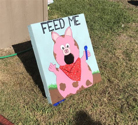 Feed The Pig Game You Toss Carrots And Apples Through The Pigs Mouth
