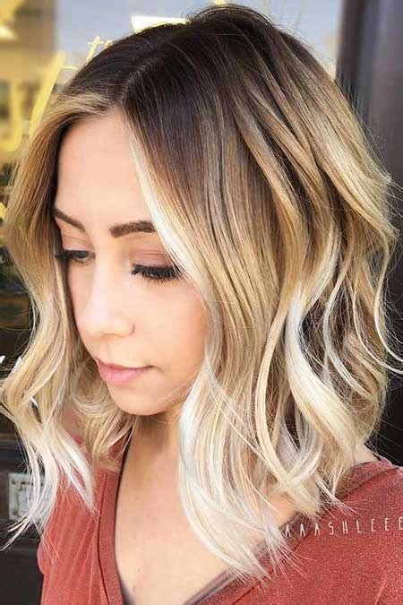 Woman with digital tablet in urban setting. 15 Best Balayage Blonde Curly Hairstyles | Hairstyles and ...