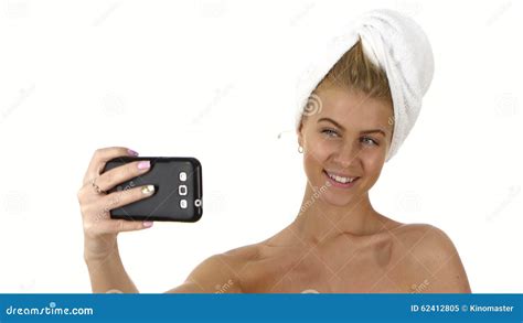 woman with a towel on her head takes selfie close stock video video of self lips 62412805