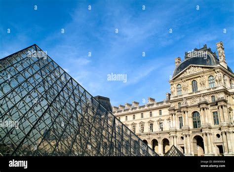 Courtyard And The Louvre Pyramid Main Entrance To The Louvre Museum
