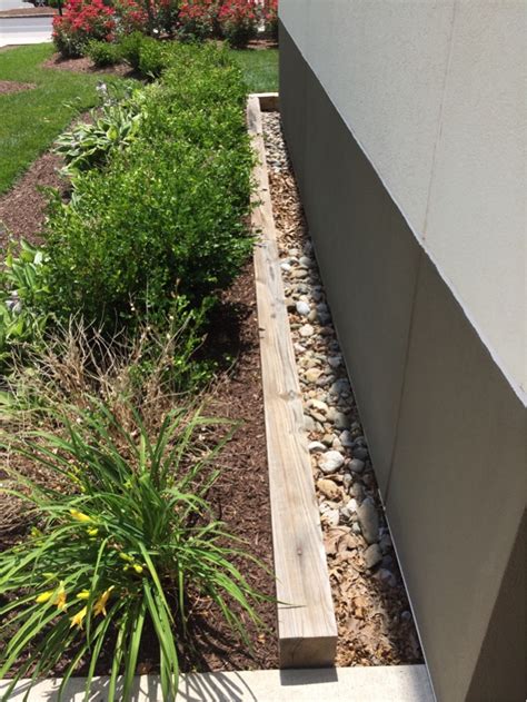 From what i've gathered mulch, dirt, plants, etc. lawn - Why do many landscapers put gravel around the base ...