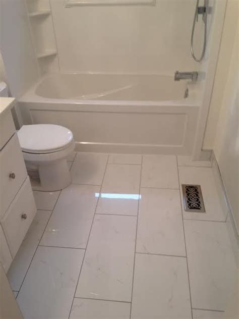 Have a professional install a shower membrane and shower pan appropriate for the space. Tiles, 12x24 Tile In A Small Bathroom 12x24 Bathroom Tile ...