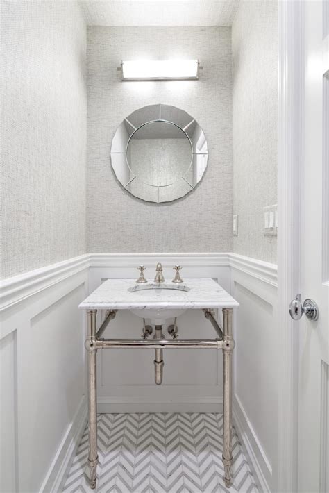 Try installing a sink that is fixed to the wall, including faucets attached to the wall itself in order to save space. Neutral Powder Room With Chevron Floors | HGTV