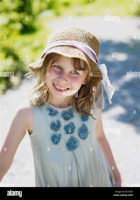 Portrait Of Girl Wearing Straw Hat Stock Photo Alamy