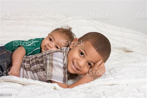 Two Multiethnic Boys Brothers Stock Photo Download Image Now Child
