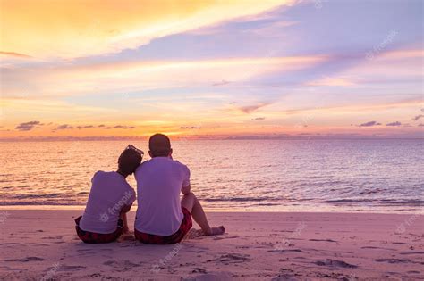 premium photo romantic love couple on beach at colorful sunset on background tranquil tropical